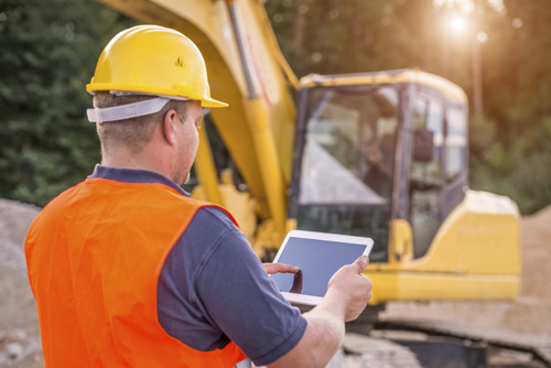 construction worker with tablet